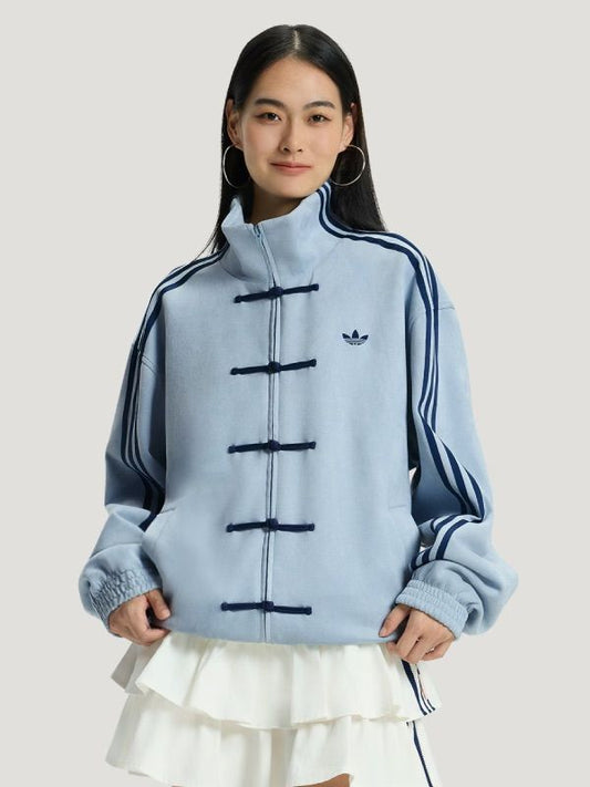 Front view of Suspended Clothing aqua blue CNY jacket, the standout piece from our Lunar New Year clothing collection 2026