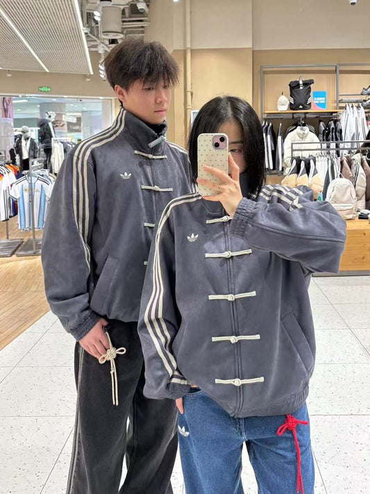 Model wearing Cny Jacket, styling the oversized ash grey lunar new year outfit
