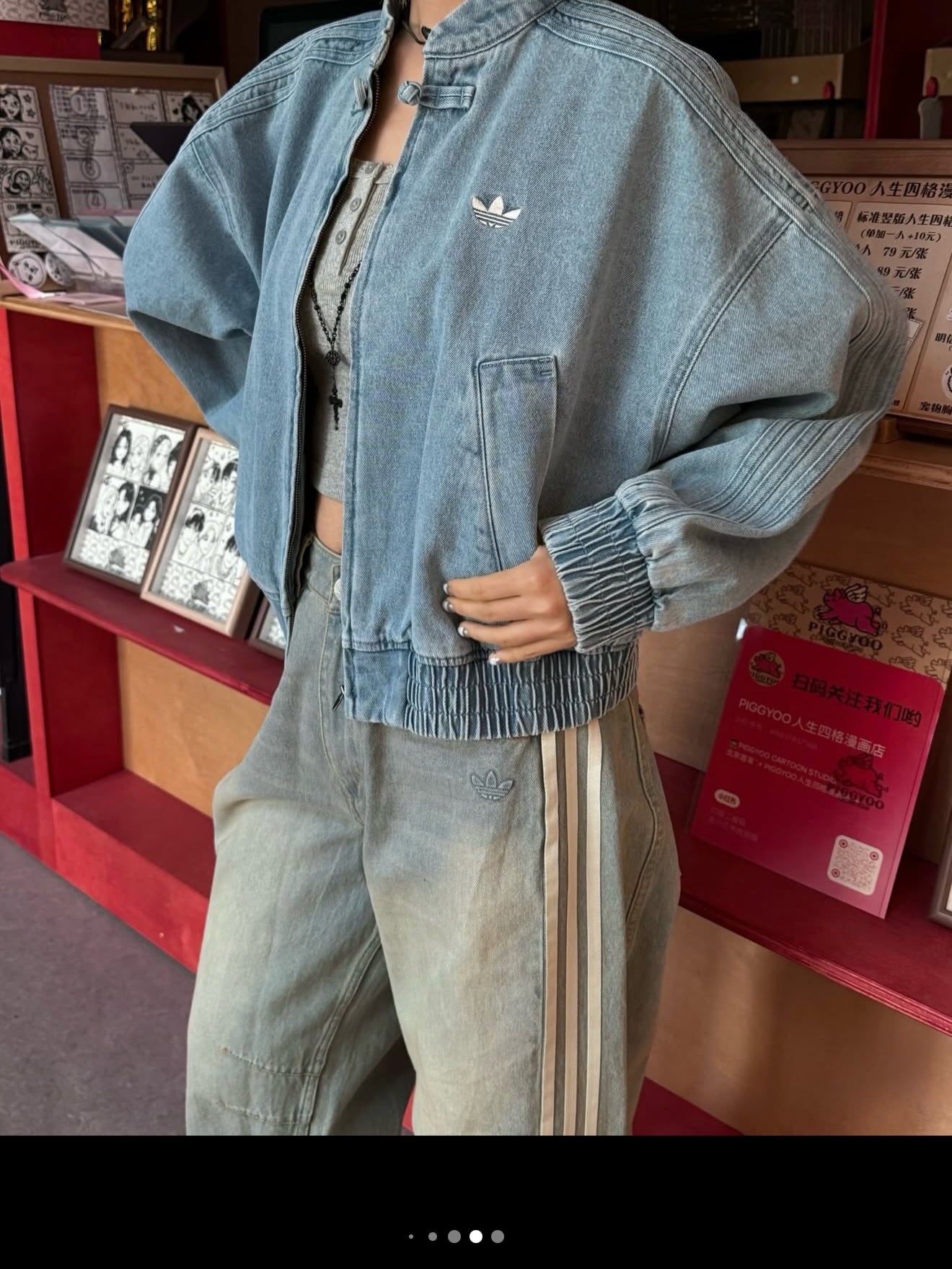 Model wearing the vintage-inspired indigo outerwear layered over a white t-shirt and cargos.