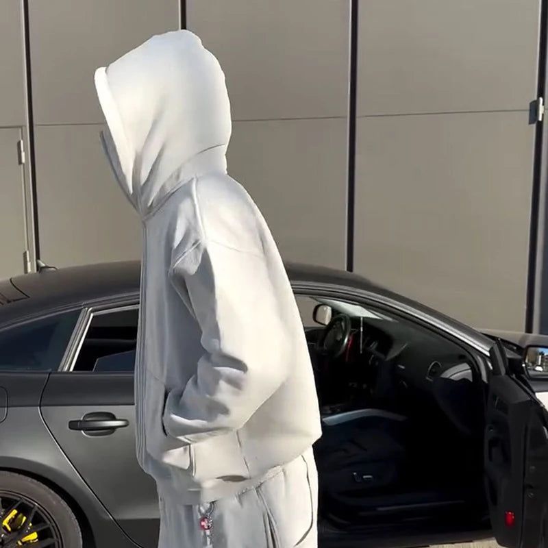 Detail shot of high-density 450GSM fabric on Suspended Clothing premium white streetwear hoodie.