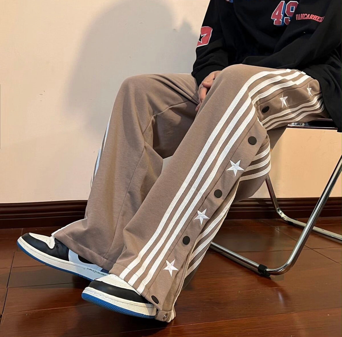the durable matte metal snap buttons on Suspended Clothing side-snap breakaway pants.