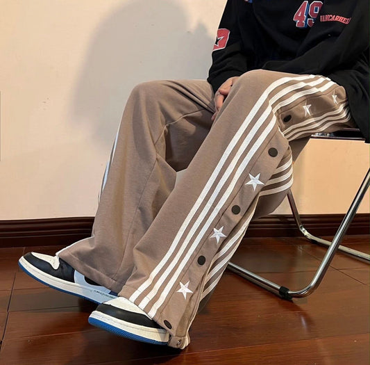 the durable matte metal snap buttons on Suspended Clothing side-snap breakaway pants.