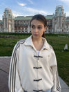 Suspended Clothing white CNY jacket with mandarin collar and frog closures for Indian and global streetwear