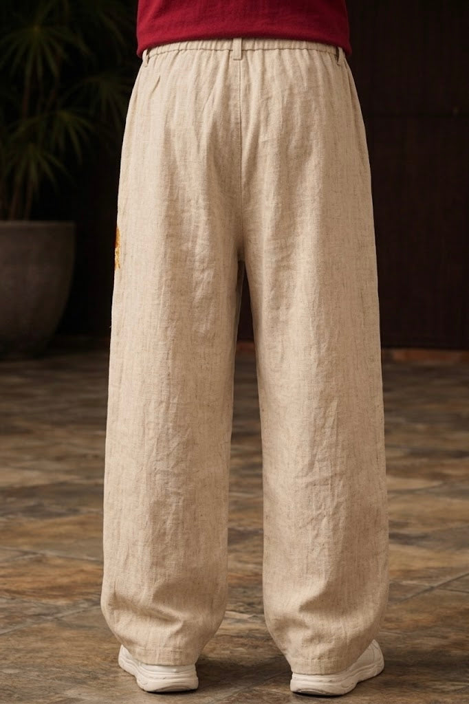 Suspended Clothing premium embroidered baggy trousers featuring ancient Chinese art inspired floral patterns.