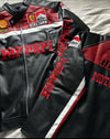 Black and burgundy biker jacket with Ferrari logos, Olympus patch, and racing-inspired details.