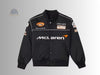 the black McLaren F1 parachute jacket showing the relaxed, oversized windbreaker fit.